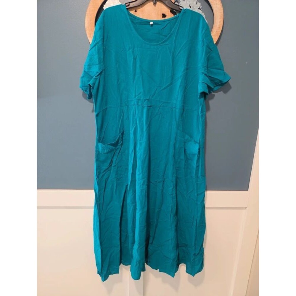 Woman's sz. 3x. Lightweight dress. Teal color. New no tags.